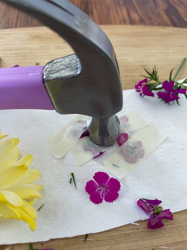 use a hammer to pound flowers