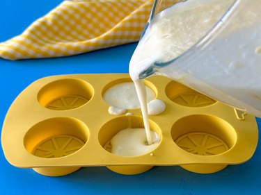 pour mixture into ice cube trays