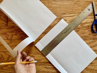 Ruler on top of white card stock