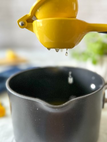squeeze the juice of one lemon into dandelion-infused liquid