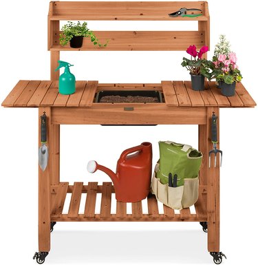 Best Choice Products Mobile Garden Potting Bench Against a White Background