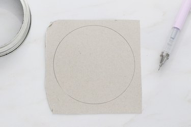 Trace circle on scrap cardboard