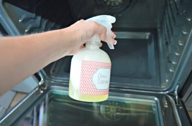 Cleaning inside oven with spray