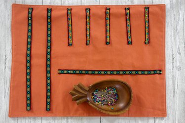 pin long ribbons to place mat