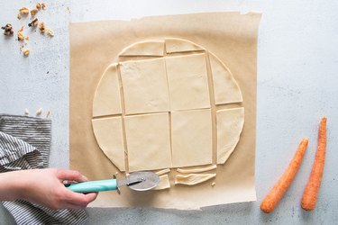 Pie dough on parchment paper