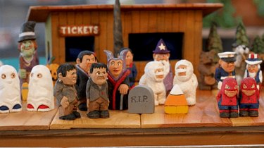 Halloween-themed painted wooden figurines created by Sharon Elliot.