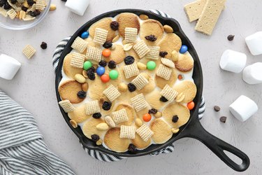 Campfire s'mores dip with trail mix on top