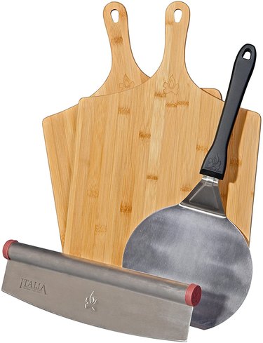Camp Chef bundle of two pizza peels, pizza spatula and pizza cutter on a white ground