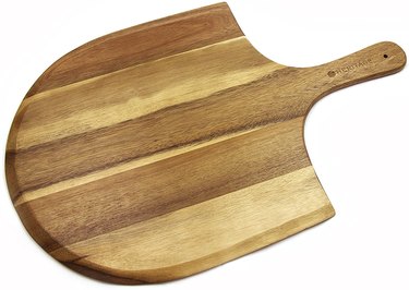 Heritage wooden cutting board on a white ground, 3/4 view