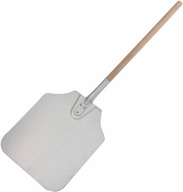 Winco commercial pizza peel on a white ground