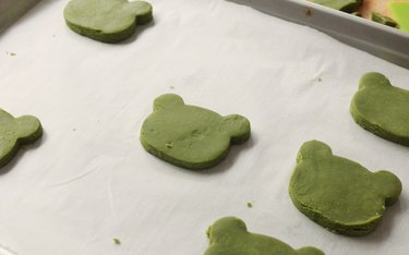 Frog-shaped shortbread ready to be baked in the oven