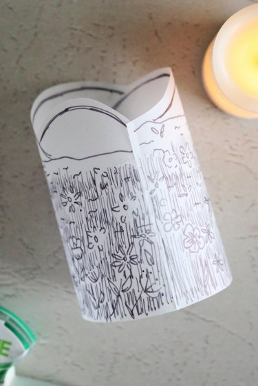 DIY paper lantern with a drawing of a field of flowers