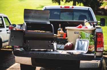 Traeger Tailgater 20 Portable Wood Pellet Grill and Smoker in the Back of a Pick-up Truck