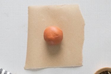 Clay ball on parchment paper