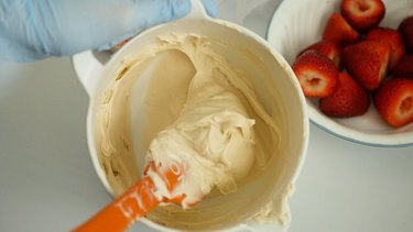 mixing cheesecake filling