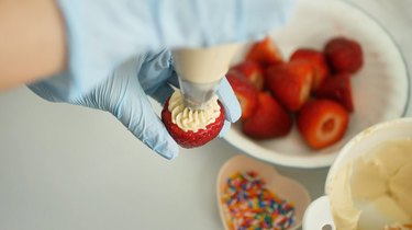 filling strawberry with no-bake cheesecake filling