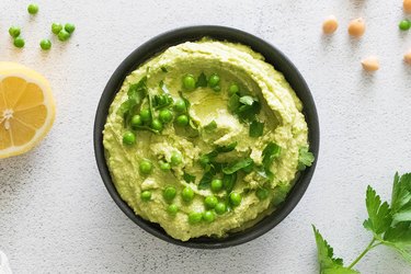 Green pea hummus in bowl
