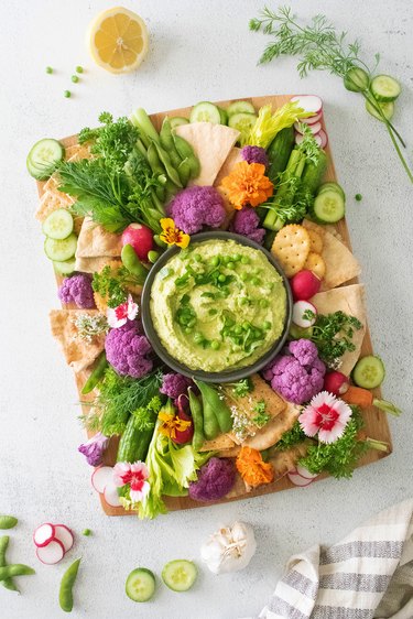 spring hummus board with green pea hummus