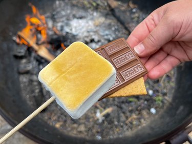 s'more over campfire