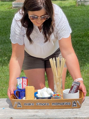 setting s'more station on table