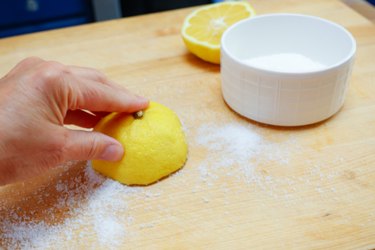 use lemons and salt to clean cutting boards