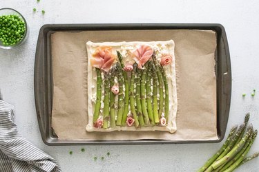 Asparagus tart with prosciutto flowers