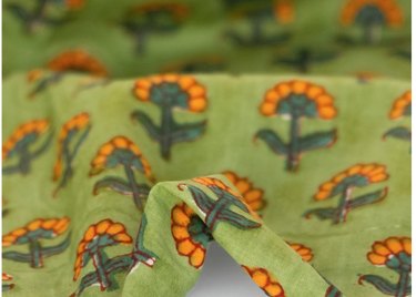 Orange flowers on green fabric