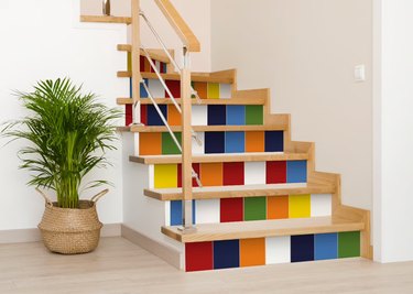 Staircase with risers covered in multicolored square tiles