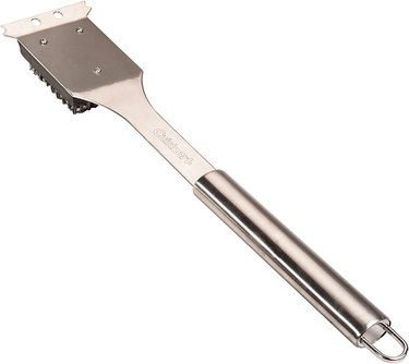 A Cuisinart Grill Cleaning Brush and Scraper
