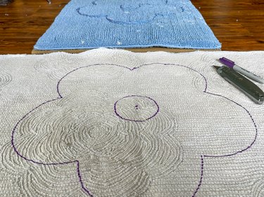 trace the pattern onto the second rug