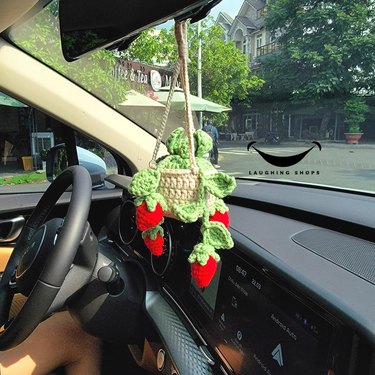 Crochet red and green strawberries hanging from car mirror
