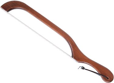 An Out of the Woods of Oregon Bread & Bagel Slicer that's bow-shaped with a walnut-finished handle.