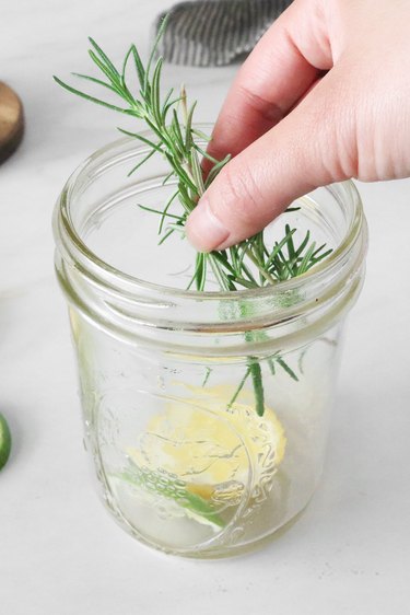 Add fresh rosemary or eucalyptus to a jar