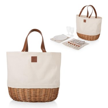 Picnic Time Promenade Picnic Tote in off-white canvas and wicker with leather straps.