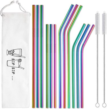 Reusable metal straws (bent and straight) in iridescent rainbow hues with two cleaning brushes and a carrying pouch.