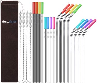 Reusable straws with rainbow colored silicone tips in straight or bent versions, along with pipe cleaners.