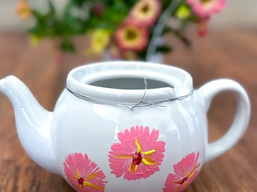 Wire wrapped around teapot