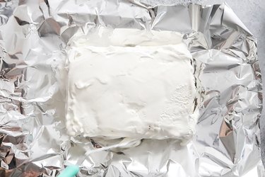 Ice cream sandwiches covered in whipped cream