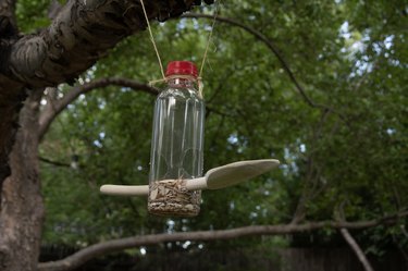 DIY recycled bottle bird feeder