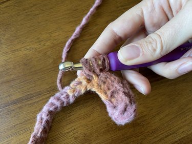 A double crochet stitch in progress