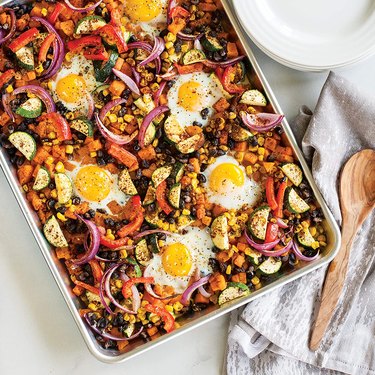 Sheet pan meal of roasted veggies and eggs on a Nordic Ware half sheet pan