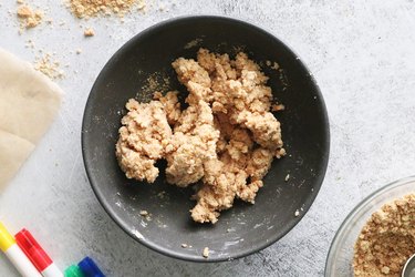 Graham cracker crumbs and cream cheese mixed together