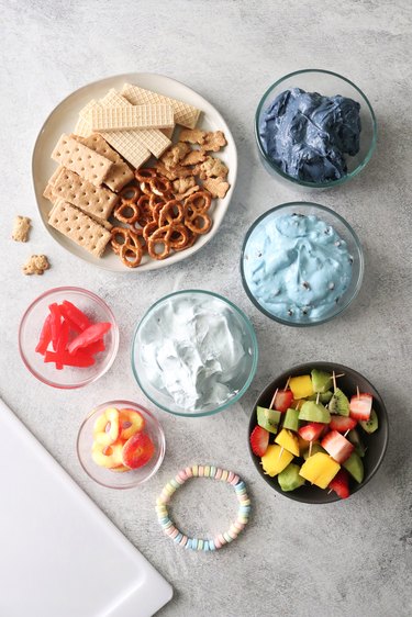 Ingredients for a pool-themed dessert dip board