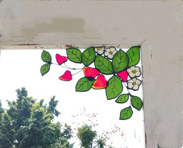 Strawberry and leaves stained glass in window corner