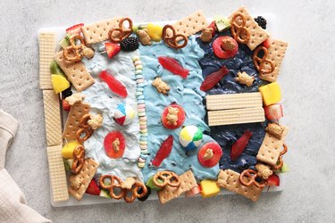 Pool-themed dessert dip board