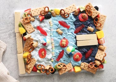 Pool-themed dessert dip board