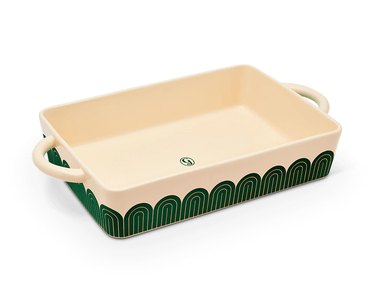 Great Jones "Hot Dish" baking dish in a green pattern, shown on a white ground