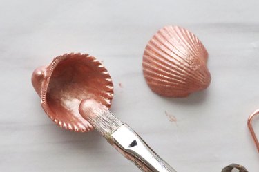 Paint seashells with metallic acrylic paint