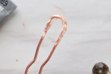 Add glue to hair pins