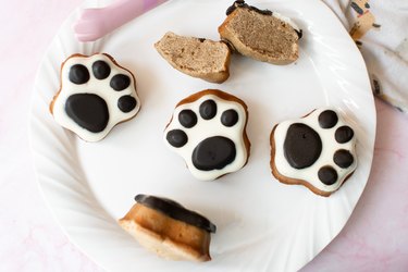 Paw print madeleines on a white plate